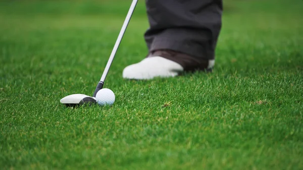 Warsaw, Poland, 09.29.2021 shooting golf ball with a club — Stock Photo, Image