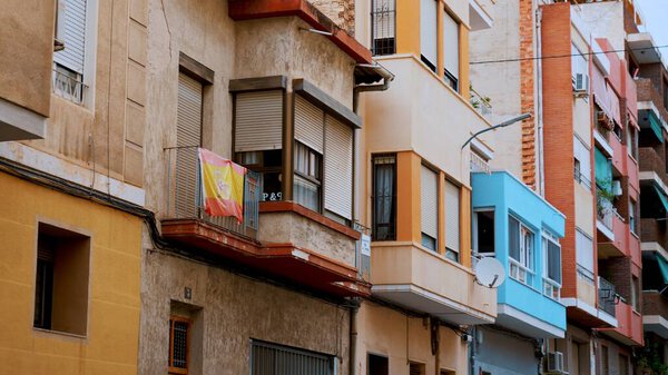 Focus on different buildings next to each other in a Spanish destination. High-quality photo