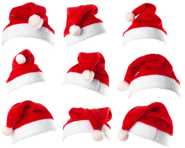 Set von 9 roten Nikolausmützen isoliert auf weißem Hintergrund — Stockfoto