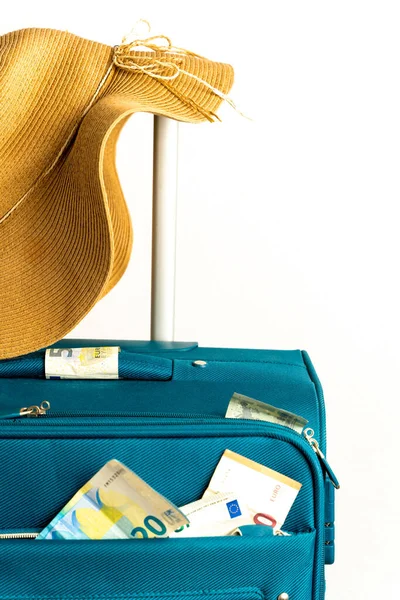 travel suitcase, hat and ticket isolated on white background. high quality photo