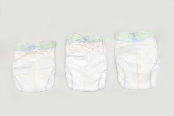 Set of disposable soft new baby diapers — Stockfoto