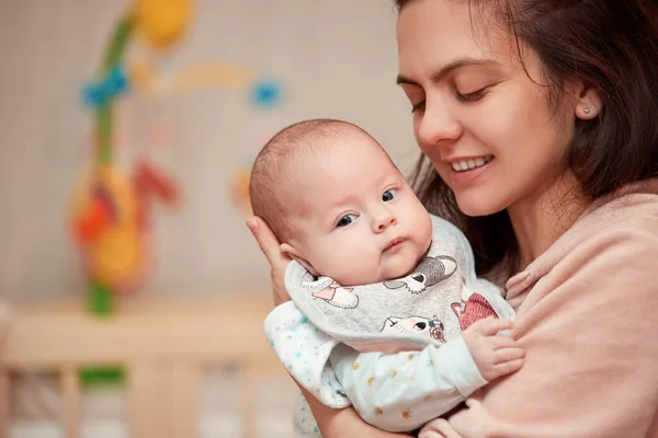 Young Mother Hugs Her Adorable Newborn Baby Copy Space — Stock Photo, Image