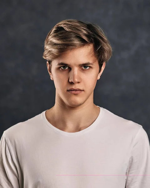 Young Man Frowning Gray Background Human Emotions Facial Expressions — стоковое фото