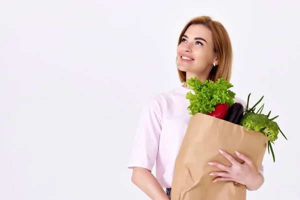 Young Happy Blonde Vegetarian Woman Casual Clothes Hold Paper Bag — 스톡 사진