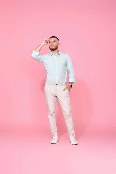 Positive Dreamy Thoughtful Young Man Thinking Isolated Pink Background Full — Φωτογραφία Αρχείου
