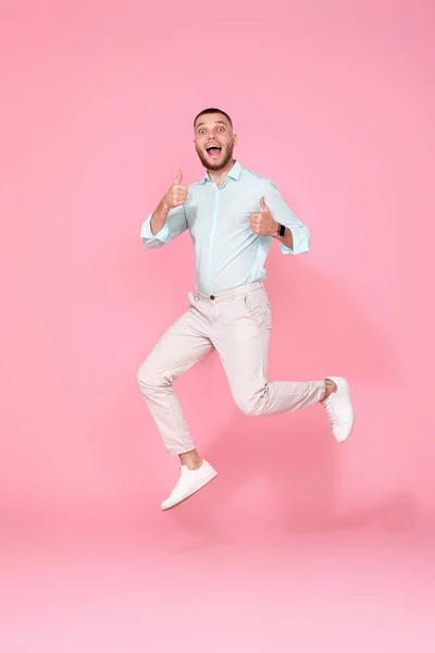 Young Man Summer Clothes Jumping Isolated Pink Background Full Length — Φωτογραφία Αρχείου