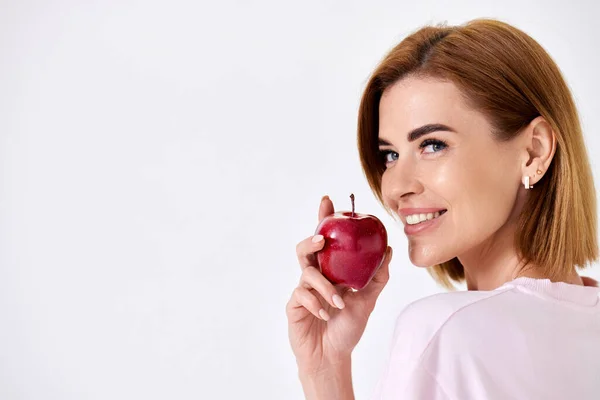 Smiling Pretty Girl Holding Red Apple Isolated White Background Close — Zdjęcie stockowe