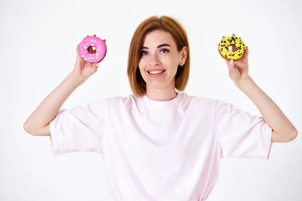 Smiling Beautiful Blonde Woman Pink Yellow Donuts Isolated White Background — стоковое фото