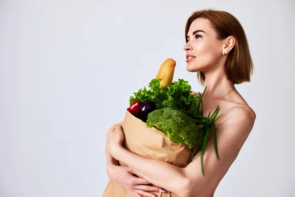 Beautiful Smiling Slim Woman Holding Paper Bag Vegetables Looking Copy — Stock Photo, Image
