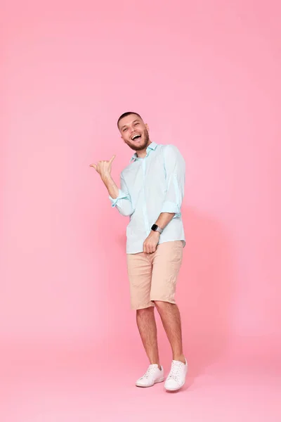 Cheerful Young Happy Man Dance Pink Background Vacation Summer Full — Φωτογραφία Αρχείου