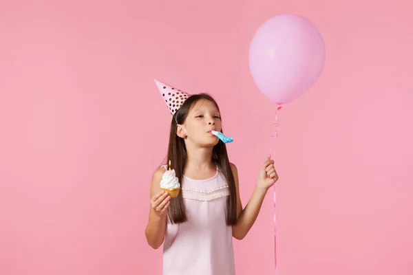 Happy Little Birthday Girl Party Cone Hat Whistle Holding Cupcake — Fotografia de Stock