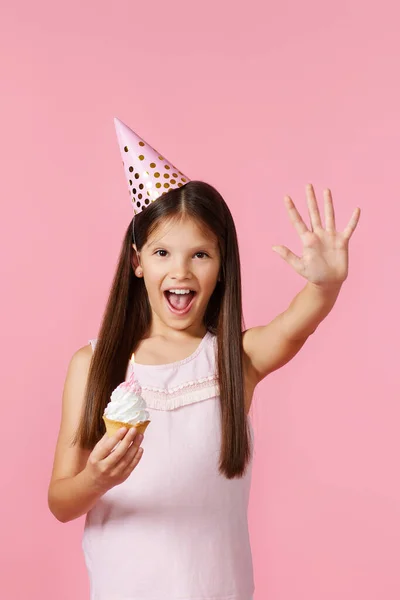 Happy Little Birthday Girl Party Cone Holding Cupcake Pink Background — Photo