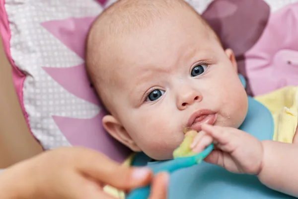 Mom Feeds Her Baby Girl Spoon Baby Chair Mother Gives — ストック写真