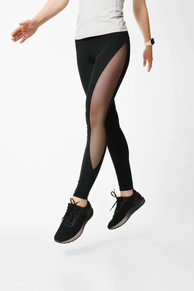 Slim Female Legs Black Sport Leggings Running Shoes Jumping White — Fotografia de Stock