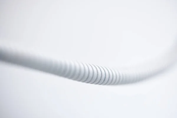 White Plastic Corrugated Pipe White Background Selective Focus — Stock Photo, Image