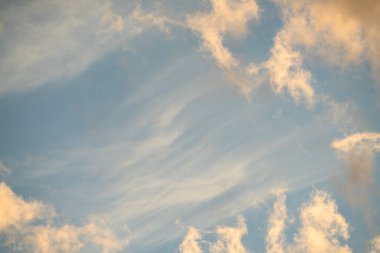 colorful fluffy clouds on blue sky in summer