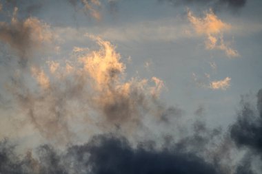 colorful fluffy clouds on blue sky in summer