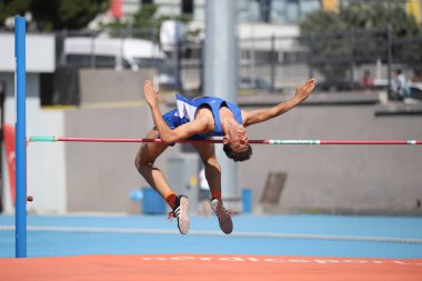 ISTANBUL, TURKEY - AUGUST 07, 2021: Undefined athlete high jumping during Turkish Athletic Federation Olympic Threshold Competitions