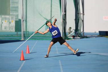 ISTANBUL, TURKEY - AUGUST 08, 2021: Undefined athlete javelin throwing during Turkish Athletic Federation Olympic Threshold Competitions