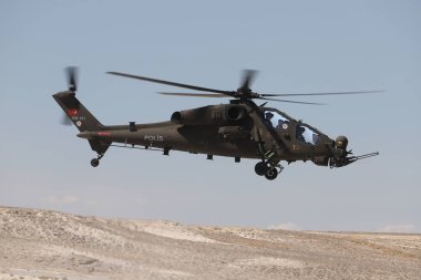 ESKISEHIR, TURKEY - 12 Eylül 2021: Sivrihisar SHG Hava Gösterisinde Türk Polis Gücü TAI-129A ATAK gösterisi