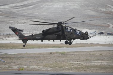 ESKISEHIR, TURKEY - 12 Eylül 2021: Sivrihisar SHG Hava Gösterisinde Türk Polis Gücü TAI-129A ATAK gösterisi