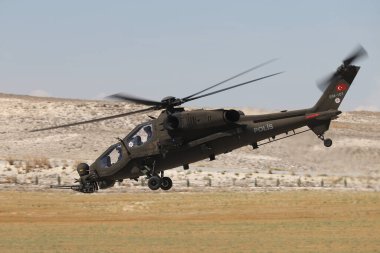 ESKISEHIR, TURKEY - 12 Eylül 2021: Sivrihisar SHG Hava Gösterisinde Türk Polis Gücü TAI-129A ATAK gösterisi