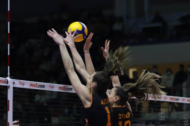 ISTANBUL, TURKEY - MARCH 13, 2022: Anthi Vasilantonaki and Zeynep Sude Demirel in action during Galatasaray HDI Sigorta vs Vakifbank Turkish Sultans League match in Burhan Felek Sport Hall