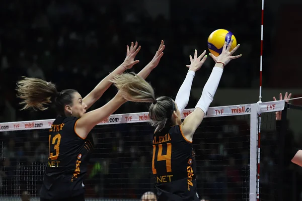 ISTANBUL, TURKEY - MARCH 13, 2022: Zeynep Sude Demirel and Alexia Ioana Carutasu in action during Galatasaray HDI Sigorta vs Vakifbank Turkish Sultans League match in Burhan Felek Sport Hall