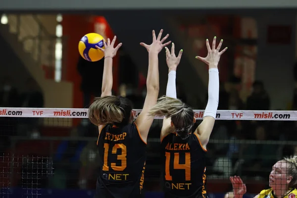 ISTANBUL, TURKEY - MARCH 13, 2022: Zeynep Sude Demirel and Alexia Ioana Carutasu in action during Galatasaray HDI Sigorta vs Vakifbank Turkish Sultans League match in Burhan Felek Sport Hall