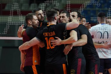 ISTANBUL, TURKEY - MARCH 26, 2022: Galatasaray players celebrating score point during Altekma SK Turkish Mens Volleyball League match in Burhan Felek Sport Hall