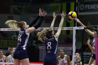 ISTANBUL, TURKEY - MARCH 13, 2022: Kelsey Veltman and Nazli Eda Kafkas in action during Yesilyurt vs Fenerbahce Opet Turkish Sultans League match in Burhan Felek Sport Hall
