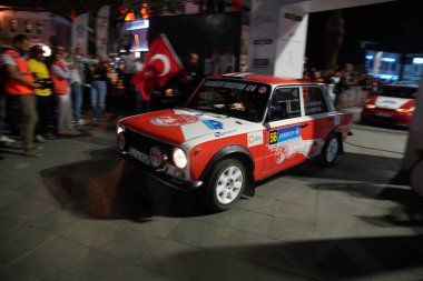 MUGLA, TURKEY - APRIL 15, 2022: Onur Celikyay with Murat 124 in ceremonical start of Bodrum Rally