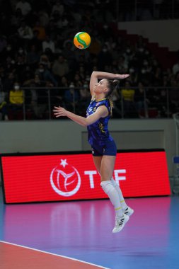 ISTANBUL, TURKEY - APRIL 06, 2022: Mina Popovic serves during Fenerbahce Opet vs Vakifbank CEV Champions League Volley Semi Final match in Vakifbank Sport Hall