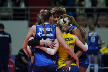 ISTANBUL, TURKEY - APRIL 06, 2022: Fenerbahce Opet players celebrating score point during Vakifbank CEV Champions League Volley Semi Final match in Vakifbank Sport Hall
