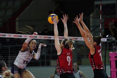 ISTANBUL, TURKEY - APRIL 02, 2022: Asli Kalac and Lauren Carlini in action during Turk Hava Yollari vs PTT Turkish Sultans League match in Burhan Felek Sport Hall