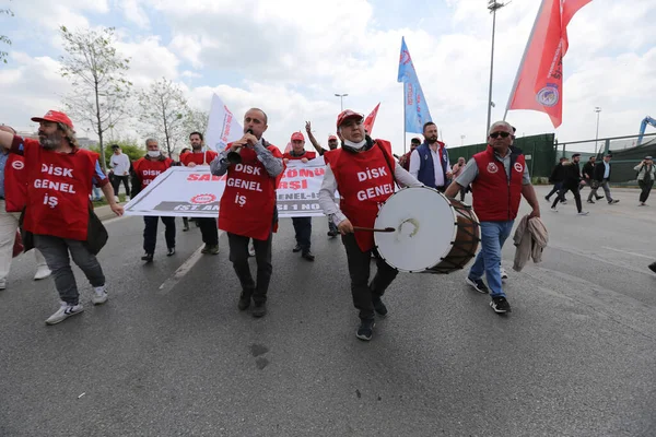 ISTANBUL, TURKEY - MAY 01, 2022: People march in International Workers Day