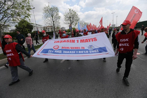 ISTANBUL, TURKEY - MAY 01, 2022: People march in International Workers Day