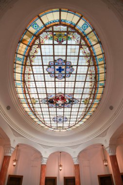ANKARA, TURKIYE - JUNE 04, 2022: Stained glass roof of Turkiye Is Bankasi Economic Independence Museum where was built in 1929 as the headquarters of Turkiye Is Bankasi converted to museum in 2019