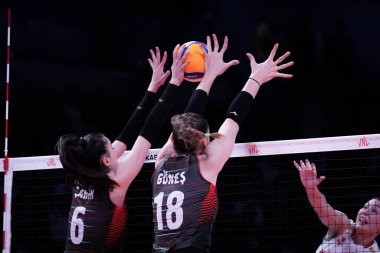 ANKARA, TURKIYE - JUNE 04, 2022: Sahin Saliha and Gunes Zehra in action during Bulgaria vs Turkiye VNL Pool match in Ankara Arena