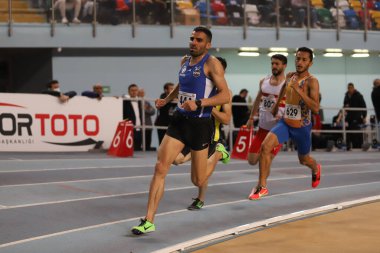 ISTANBUL, TURKEY - FEBRUARY 26, 2022: Athletes running during Turkish Indoor Athletics Championships in Atakoy Athletics Arena