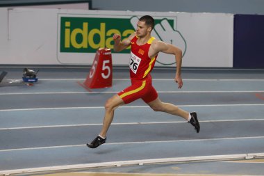 İSTANBUL, TURKEY - Mart 05, 2022: Atakoy Atletizm Arenasında düzenlenen Balkan Atletizm Şampiyonası sırasında Jovan Stojoski