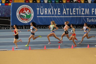 ISTANBUL, TURKEY - MARCH 05, 2022: Athletes running during Balkan Athletics Indoor Championships in Atakoy Athletics Arena