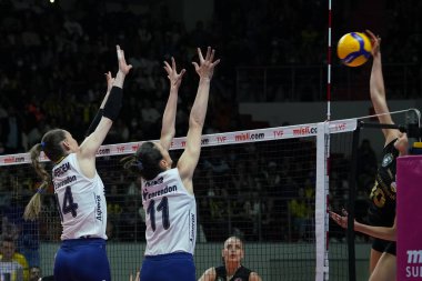 ISTANBUL, TURKEY - APRIL 30, 2022: Eda Erdem Dundar and Naz Aydemir Akyol in action during Fenerbahce Opet vs Vakifbank Turkish Sultans League Playoff Final match in Burhan Felek Sport Hall