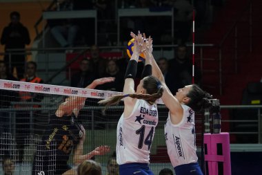 ISTANBUL, TURKEY - APRIL 30, 2022: Eda Erdem Dundar and Naz Aydemir Akyol in action during Fenerbahce Opet vs Vakifbank Turkish Sultans League Playoff Final match in Burhan Felek Sport Hall
