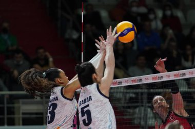 ISTANBUL, TURKEY - APRIL 02, 2022: Amanda Campos and Bahar Akbay in action during Turk Hava Yollari vs PTT Turkish Sultans League match in Burhan Felek Sport Hall