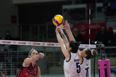 ISTANBUL, TURKEY - APRIL 02, 2022: Bahar Akbay and Sila Caliskan in action during Turk Hava Yollari vs PTT Turkish Sultans League match in Burhan Felek Sport Hall