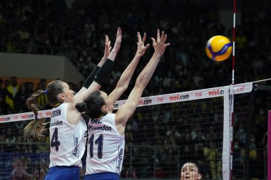 ISTANBUL, TURKEY - MAY 09, 2022: Eda Erdem Dundar and Naz Aydemir Akyol in action during Fenerbahce Opet vs Vakifbank Turkish Sultans League Playoff Final match in Burhan Felek Sport Hall
