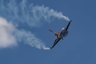 KONYA, TURKIYE - JUNE 30, 2022: Turkish Air Force General Dynamics F-16C Fighting Falcon SoloTurk (4R-23) aerobatic demonstrate over Konya Airport during Anatolian Eagle Air Force Exercise