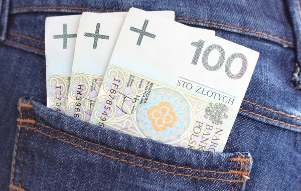 Bolso de notas e jeans — Fotografia de Stock