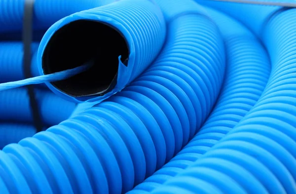 Blue hose plastic pipe — Stock Photo, Image